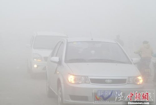 大范围雨雪降温天气席卷中国 东部大雾弥漫(图)